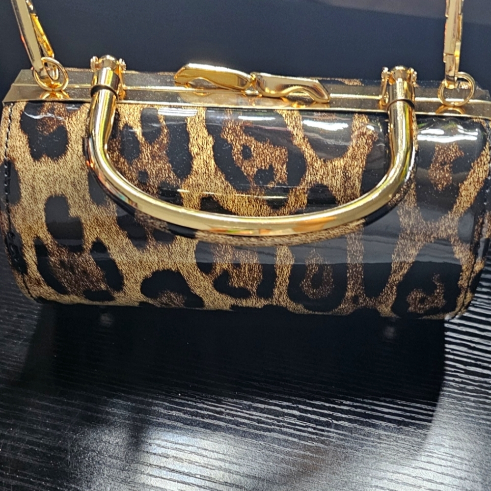 Elegant Gold and Black Leopard Print Handbag
